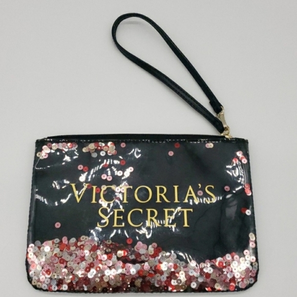Victoria's Secret Handbags - Bling rhinestone Victoria's Secret shifting sequins wristlet 8.5" × 6"